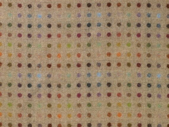 Fabric swatch showing the Abraham Moon Multispot Natural Fabric